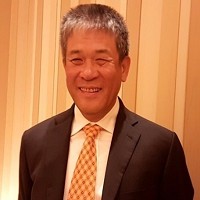 創見董事長束崇萬